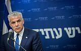 Yesh Atid leader Yair Lapid heads a party faction meeting at the Knesset on July 16, 2018. (Miriam Alster/Flash90)