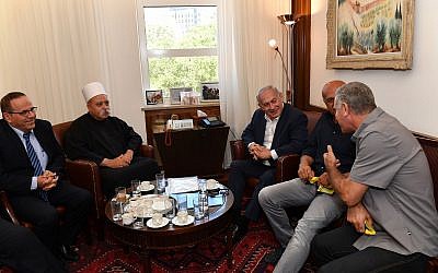 Prime Minister Benjamin Netanyahu, 2r, meets with the spiritual leader of the Druze community in Israel, Sheikh Muafak Tarif, 2l, at the Prime Minister's Office in Jerusalem on July 27, 2018. (Kobi Gideon/GPO)
