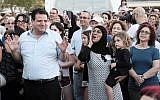 Joint List party leader Ayman Odeh (L) attends a protest against the nation-state law in Tel-Aviv on July 30, 2018 (Tomer Neuberg/Flash90)