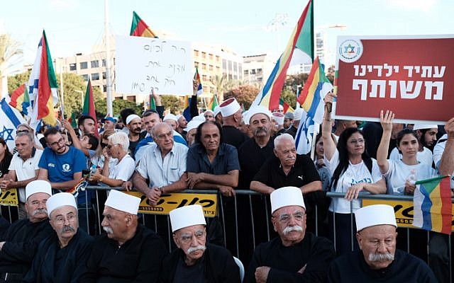 Protesters from the Druze community in Israel rally against the Jewish nation-state bill, at Rabin Square in Tel Aviv on August 4, 2018. (Tomer Neuberg/Flash90)