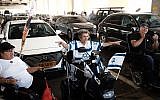 Disabled protesters block traffic at Ben Gurion Airport to call for higher monthly benefits on August 7, 2018. (Tomer Neuberg/Flash90)