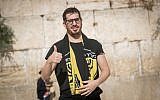 Moshe Hogeg, an Israeli businessman and the new owner of the Beitar Jerusalem soccer club, visits the Western Wall in Jerusalem's Old City, on August 13, 2018. (Yonatan Sindel/Flash90)