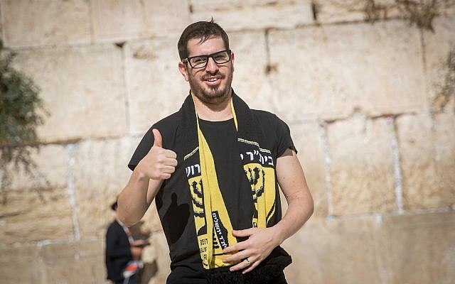 Moshe Hogeg, an Israeli businessman and the new owner of the Beitar Jerusalem soccer club, visits the Western Wall in Jerusalem's Old City, on August 13, 2018. (Yonatan Sindel/Flash90) Moshe Hogeg, an Israeli businessman and the new owner of the Beitar Jerusalem soccer club, visits the Western Wall in Jerusalem's Old City, on August 13, 2018. (Yonatan Sindel/Flash90)