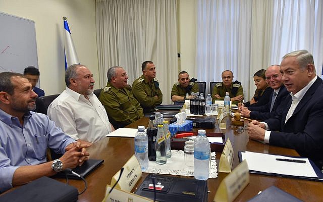 Prime Minister Benjamin Netanyahu (R) and Defense Minister Avigdor Liberman (2nd-L) meet with top IDF generals and Israeli security officials at the military's Kirya headquarters in Tel Aviv on August 9, 2018. (Ariel Hermoni/ Defense Ministry) Prime Minister Benjamin Netanyahu (R) and Defense Minister Avigdor Liberman (2nd-L) meet with top IDF generals and Israeli security officials at the military's Kirya headquarters in Tel Aviv on August 9, 2018. (Ariel Hermoni/ Defense Ministry)