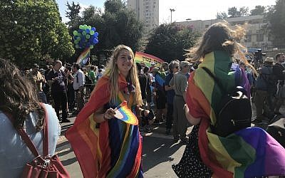 People gather for the annual Pride Parade in Jerusalem on August 2, 2018. (Luke Tress/Times of Israel)