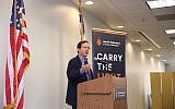 Isaac Herzog, shown speaking August 8, 2018 at the Jewish Federation of Greater Philadelphia, called for unity and pluralism in his first US visit as chair of the Jewish Agency for Israel. (Courtesy JAFI via JTA)