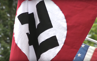 Illustrative: A Nazi flag flown in the United States. (Screenshot: YouTube)