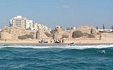 Medics attempt to resuscitate a man at an unauthorized beach in Ashdod on August 19, 2018. (Israel Police)