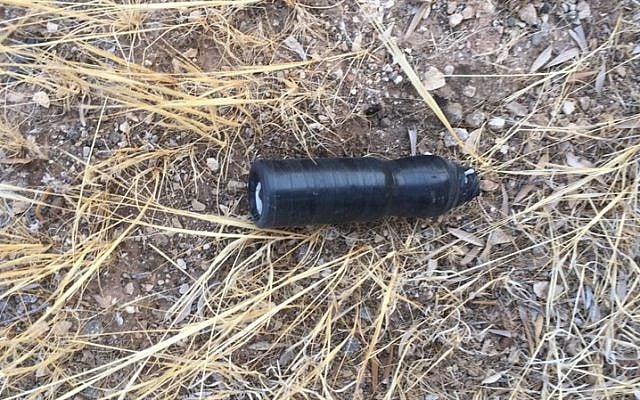 A pipe bomb found in the possession of three Palestinian suspects outside the West Bank village of Deir al-Hatab on August 30, 2018. (Israel Defense Forces) A pipe bomb found in the possession of three Palestinian suspects outside the West Bank village of Deir al-Hatab on August 30, 2018. (Israel Defense Forces)