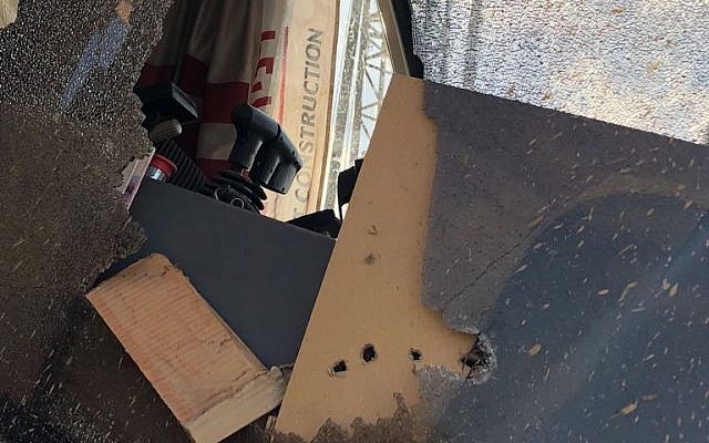 Damage to a construction vehicle outside the Gaza Strip, which the military says was caused by gunfire from the Palestinian enclave, on August 8, 2018. (Israel Defense Forces) Damage to a construction vehicle outside the Gaza Strip, which the military says was caused by gunfire from the Palestinian enclave, on August 8, 2018. (Israel Defense Forces)