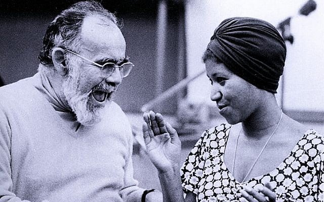 Jerry Wexler and Aretha Franklin in a recording studio in 1960. (GAB Archive/Redferns/via JTA)