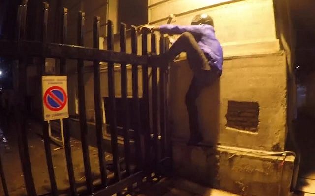 Members of Greek anarchsit group Rubicon sneak inside the foreign ministry building in Athens on August 28, 2018. (screen capture: LiveLeak) Members of Greek anarchsit group Rubicon sneak inside the foreign ministry building in Athens on August 28, 2018. (screen capture: LiveLeak)