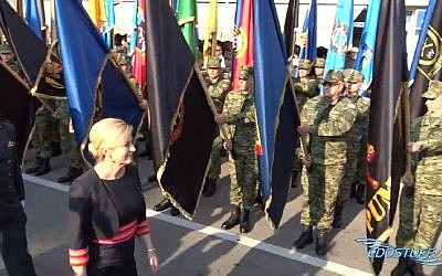Croatian President Kolinda Grabar-Kitarovic reviews the troops at a ceremony marking the country's 1995 victory over Serbia. (Screen capture: YouTube) Croatian President Kolinda Grabar-Kitarovic reviews the troops at a ceremony marking the country's 1995 victory over Serbia. (Screen capture: YouTube)
