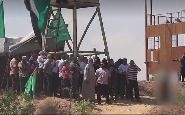 A still from a video released by Hamas claiming to show Gazan snipers taking pat in a military drill before being shelled by the IDF, on August 7, 2018. (screen capture: Aqsa Voice) A still from a video released by Hamas claiming to show Gazan snipers taking pat in a military drill before being shelled by the IDF, on August 7, 2018. (screen capture: Aqsa Voice)
