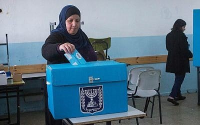 Arab Israelis cast their votes at a polling station in the Arab neighborhood of Beit Safafa in Jerusalem, on March 17, 2015, in the Israeli general elections for the 20th parliament. (FLASH90/Miriam Alster)
