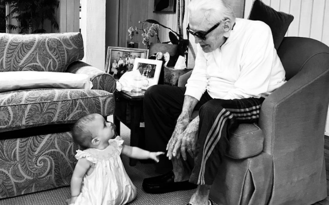 Kirk Douglas dotes on his great-granddaughter, Lua Izzy in a picture posted in August 2018. (Cameron Douglas/Instagram via JTA) Kirk Douglas dotes on his great-granddaughter, Lua Izzy in a picture posted in August 2018. (Cameron Douglas/Instagram via JTA)
