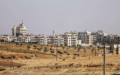 A picture taken on August 25, 2018, shows a neighborhood in the rebel-held northern Syrian city of Idlib (AFP PHOTO / OMAR HAJ KADOUR)
