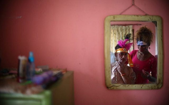 Members of Nepal's Lesbian, Gay, Bisexual and Transgender (LGBT) community prepare for a gay pride parade in Kathmandu on August 27, 2018. (Gopen RAI/AFP) Members of Nepal's Lesbian, Gay, Bisexual and Transgender (LGBT) community prepare for a gay pride parade in Kathmandu on August 27, 2018. (Gopen RAI/AFP)