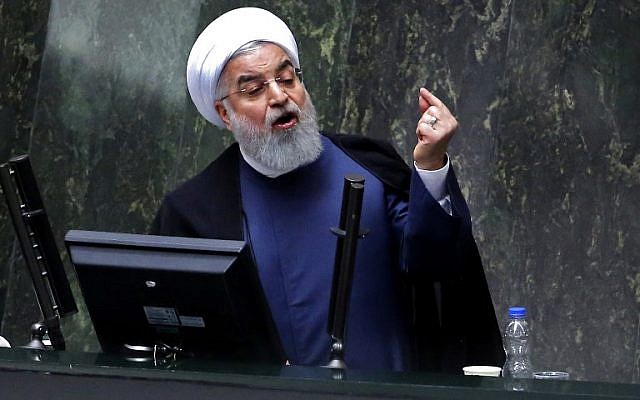 Iran's President Hassan Rouhani speaks at the Iranian Parliament in the capital Tehran on August 28, 2018. (AFP Photo/Atta Kenare)