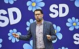 Sweden Democrats party leader Jimmie Akesson gives a speech as he campaigns in Landskrona, southern Sweden, on August 31, 2018. (AFP PHOTO / TT News Agency / Johan NILSSON )