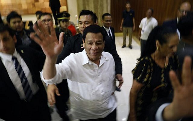 The president of the Philippines Rodrigo Roa Duterte (C) waves upon his arrival in Jerusalem at the start of an official visit to Israel, on September 2, 2018. (Menahem Kahana/AFP) The president of the Philippines Rodrigo Roa Duterte (C) waves upon his arrival in Jerusalem at the start of an official visit to Israel, on September 2, 2018. (Menahem Kahana/AFP)
