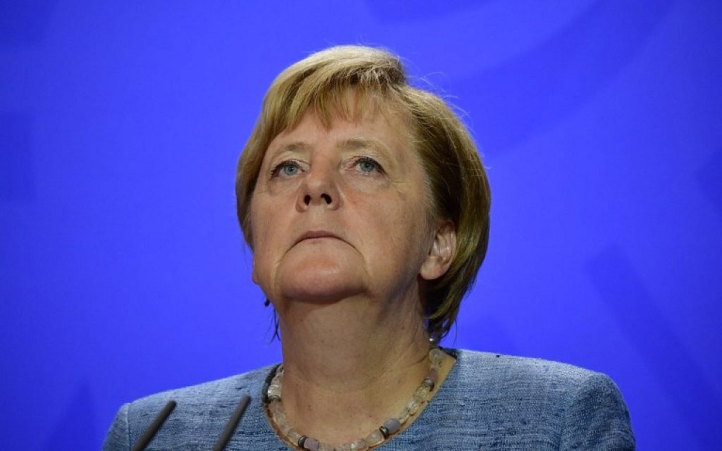 German Chancellor Angela Merkel addresses a press conference after a meeting with social partners, in Meseberg, eastern Germany, on September 3, 2018. (AFP PHOTO / Tobias SCHWARZ) German Chancellor Angela Merkel addresses a press conference after a meeting with social partners, in Meseberg, eastern Germany, on September 3, 2018. (AFP PHOTO / Tobias SCHWARZ)