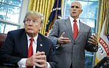 In this file photo taken on June 20, 2018 US Vice President Mike Pence speaks as US President Donald Trump looks on before signing an executive order on immigration in the Oval Office of the White House in Washington, DC. (AFP PHOTO / Mandel Ngan)