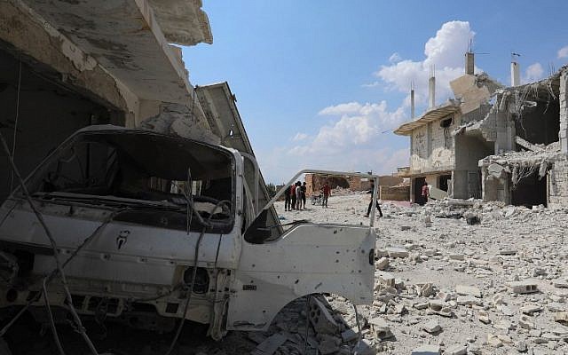 This picture shows the aftermath of strikes by Syrian government force on the town of Al Habit on the southern edges of the rebel-held Idlib province on September 9, 2018. (AFP Photo/Omar Haj Kadour) This picture shows the aftermath of strikes by Syrian government force on the town of Al Habit on the southern edges of the rebel-held Idlib province on September 9, 2018. (AFP Photo/Omar Haj Kadour)