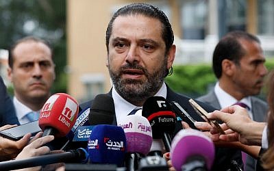 Lebanese premier-designate Saad Hariri speaks to the press in front of the Special Tribunal for Lebanon after the presentation of the closings arguments in the trial of four Hezbollah suspects accused of 2005 assassination of his father the late Lebanese prime minister on September 10, 2018, in The Hague. 
 (AFP PHOTO / ANP / Bas CZERWINSKI )