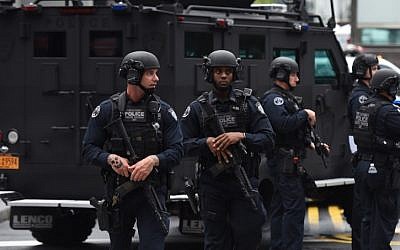 Port Authority Police Department Counter-Terrorism Police patrol during observances on September 11, 2018  held on the 17th anniversary of the September 11, 2001, terror attacks at the annual ceremony at the Ground Zero memorial site in New York. (AFP/TIMOTHY A. CLARY)