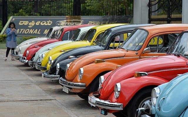 In this file photo taken on June 24, 2018 vintage Volkswagen Beetle cars are parked in a row during a rally held as part of the 23rd anniversary of 'World Wide VW Beetle Day,' in Bangalore, India. (AFP/Manjunath Kiran) In this file photo taken on June 24, 2018 vintage Volkswagen Beetle cars are parked in a row during a rally held as part of the 23rd anniversary of 'World Wide VW Beetle Day,' in Bangalore, India. (AFP/Manjunath Kiran)