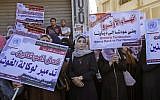 Palestinian employees of United Nations Relief and Works Agency (UNRWA) take part in a protest in Gaza City against job cuts by UNRWA on September 19, 2018 (AFP Photo/Said Khatib)