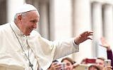 Pope Francis waves at the faithful attending his weekly general audience at the Saint Peter's square, on September 19, 2018, in the Vatican. (AFP/Alberto Pizzoli)