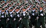 Members of Iran's Islamic Revolutionary Guard Corps (IRGC) march during the annual military parade marking the anniversary of the outbreak of the 1980-1988 war with Iraq, in the capital Tehran, on September 22, 2018. (AFP/Stringer)