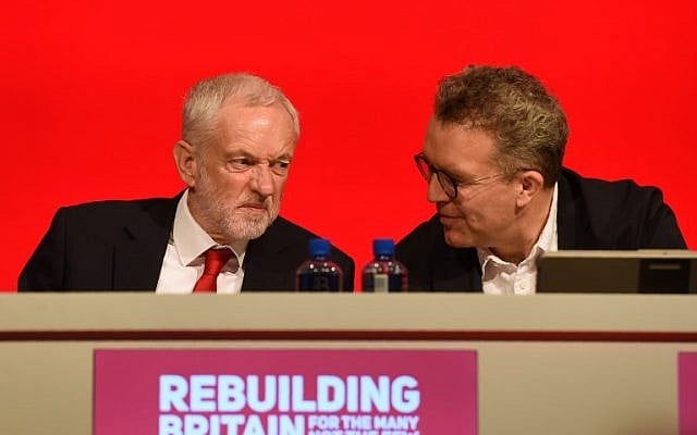 Britain's opposition Labour Party leader Jeremy Corbyn (L) chats with Tom Watson deputy leader of Britain's opposition Labour Party on stage at the Labour Party Conference in Liverpool, England on September 23, 2018, the official opening day of the annual Labour Party Conference. (AFP PHOTO / Paul ELLIS) Britain's opposition Labour Party leader Jeremy Corbyn (L) chats with Tom Watson deputy leader of Britain's opposition Labour Party on stage at the Labour Party Conference in Liverpool, England on September 23, 2018, the official opening day of the annual Labour Party Conference. (AFP PHOTO / Paul ELLIS)