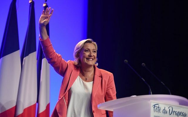 Leader of France's Rassemblement National (RN) far-right political party Marine Le Pen gestures during a party event in Mantes-la-Ville, outside Paris, on September 23, 2018. (Lucas BARIOULET/AFP) Leader of France's Rassemblement National (RN) far-right political party Marine Le Pen gestures during a party event in Mantes-la-Ville, outside Paris, on September 23, 2018. (Lucas BARIOULET/AFP)