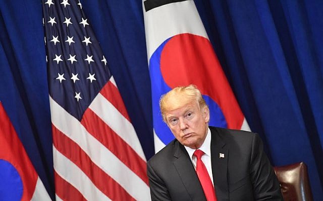 US President Donald Trump looks on during a bilateral meeting with South Korean President Moon Jae-in in New York on September 24, 2018, a day before the start of the General Debate of the 73rd session of the General Assembly. (AFP PHOTO / Nicholas Kamm) US President Donald Trump looks on during a bilateral meeting with South Korean President Moon Jae-in in New York on September 24, 2018, a day before the start of the General Debate of the 73rd session of the General Assembly. (AFP PHOTO / Nicholas Kamm)