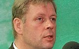 This file photo taken on August 12, 1997, in Chile shows Hartmut Hopp, a German doctor and deputy leader of Chile's secretive "Colonia Dignidad" enclave, after being arrested by Chilean police on charges of complicity in the rape of young boys in the Andean colony. (AFP Photo/Stringer)
