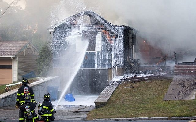 Firefighters work to extinguish a blaze caused by over pressurized gas lines on September 13, 2018 in Lawrence, Massachusetts. (Scott Eisen/Getty Images/AFP) Firefighters work to extinguish a blaze caused by over pressurized gas lines on September 13, 2018 in Lawrence, Massachusetts. (Scott Eisen/Getty Images/AFP)