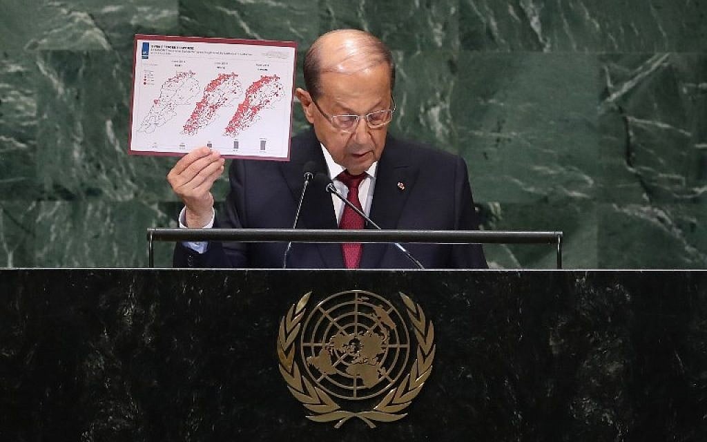 : Lebanese President Michel Aoun shows a timeline of the growth in number of Syrian refugees in Lebanon while addressing the United Nations General Assembly on September 26, 2018 in New York City. ( John Moore/Getty Images/AFP) : Lebanese President Michel Aoun shows a timeline of the growth in number of Syrian refugees in Lebanon while addressing the United Nations General Assembly on September 26, 2018 in New York City. ( John Moore/Getty Images/AFP)