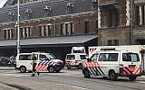 Illustrative: Dutch police officers near the scene of a stabbing attack near the central daily station in Amsterdam, the Netherlands, on August 31, 2018. (AP Photo/Alex Furtula)