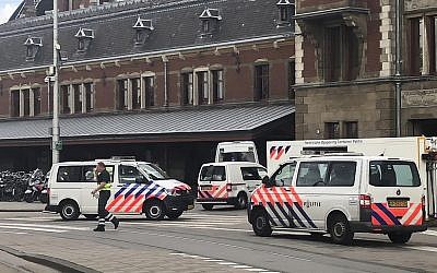 Illustrative: Dutch police officers near the scene of a stabbing attack near the central daily station in Amsterdam, the Netherlands, on August 31, 2018. (AP Photo/Alex Furtula)