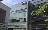 The logo of the Israeli NSO Group company on a building in Herzliya, Israel, August 25, 2016. (AP Photo/ Daniella Cheslow)