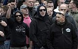 Far right demonstrators shout during a demonstration in Chemnitz, eastern Germany, Saturday, Sept. 1, 2018, after several nationalist groups called for marches protesting the killing of a German man last week, allegedly by migrants from Syria and Iraq. (AP /Jens Meyer)