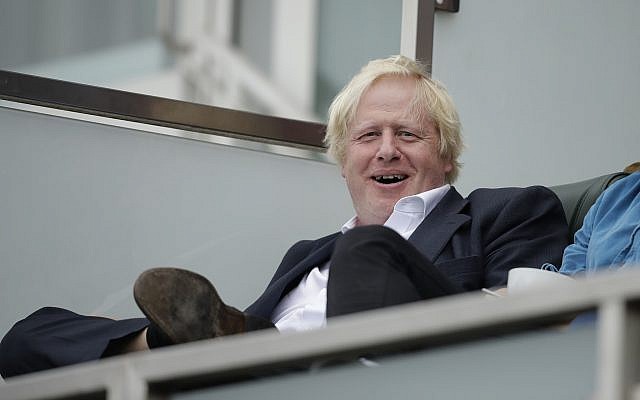 Britain's former foreign secretary Boris Johnson reacts to seeing photographers taking his picture as attends the fifth cricket test match of a five match series between England and India at the Oval cricket ground in London, September 8, 2018. (AP Photo/Matt Dunham) Britain's former foreign secretary Boris Johnson reacts to seeing photographers taking his picture as attends the fifth cricket test match of a five match series between England and India at the Oval cricket ground in London, September 8, 2018. (AP Photo/Matt Dunham)