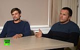 In this video grab provided by the RT channel, Ruslan Boshirov, left, and Alexander Petrov attend their first public appearance in an interview with the Kremlin-funded RT channel in Moscow, Russia, September 13, 2018. (RT channel video via AP)
