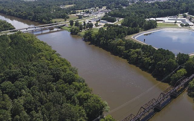 In this Tuesday afternoon, September 12, 2018 file photo provided by DroneBase, an aerial view of the Cape Fear River, North Carolina, in Buckhorn, North Carolina. (DroneBase via AP, File) In this Tuesday afternoon, September 12, 2018 file photo provided by DroneBase, an aerial view of the Cape Fear River, North Carolina, in Buckhorn, North Carolina. (DroneBase via AP, File)