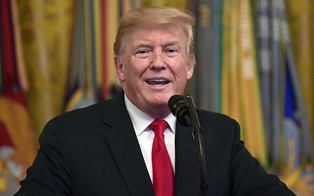US President Donald Trump speaks during a Congressional Medal of Honor Society Reception in the East Room of the White House in Washington, DC, on September 12, 2018. (AP Photo/Susan Walsh) US President Donald Trump speaks during a Congressional Medal of Honor Society Reception in the East Room of the White House in Washington, DC, on September 12, 2018. (AP Photo/Susan Walsh)