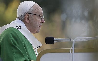 Pope Francis delivers his message as he celebrates Mass at the Santakos Park, in Kaunas, Lithuania, Sunday, Sept. 23, 2018. Francis paid tribute Sunday to Lithuanians who suffered and died during Soviet and Nazi occupations on the day the country remembers the near-extermination of its centuries-old Jewish community during the Holocaust. (AP Photo/Andrew Medichini)