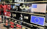 In this September 5, 2018 file photo, various currency rates are displayed at a window of an exchange shop in downtown Tehran, Iran (AP Photo/Ebrahim Noroozi, File)